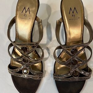 M by Marinelli  gold tone slip on heels with stones size 7.5